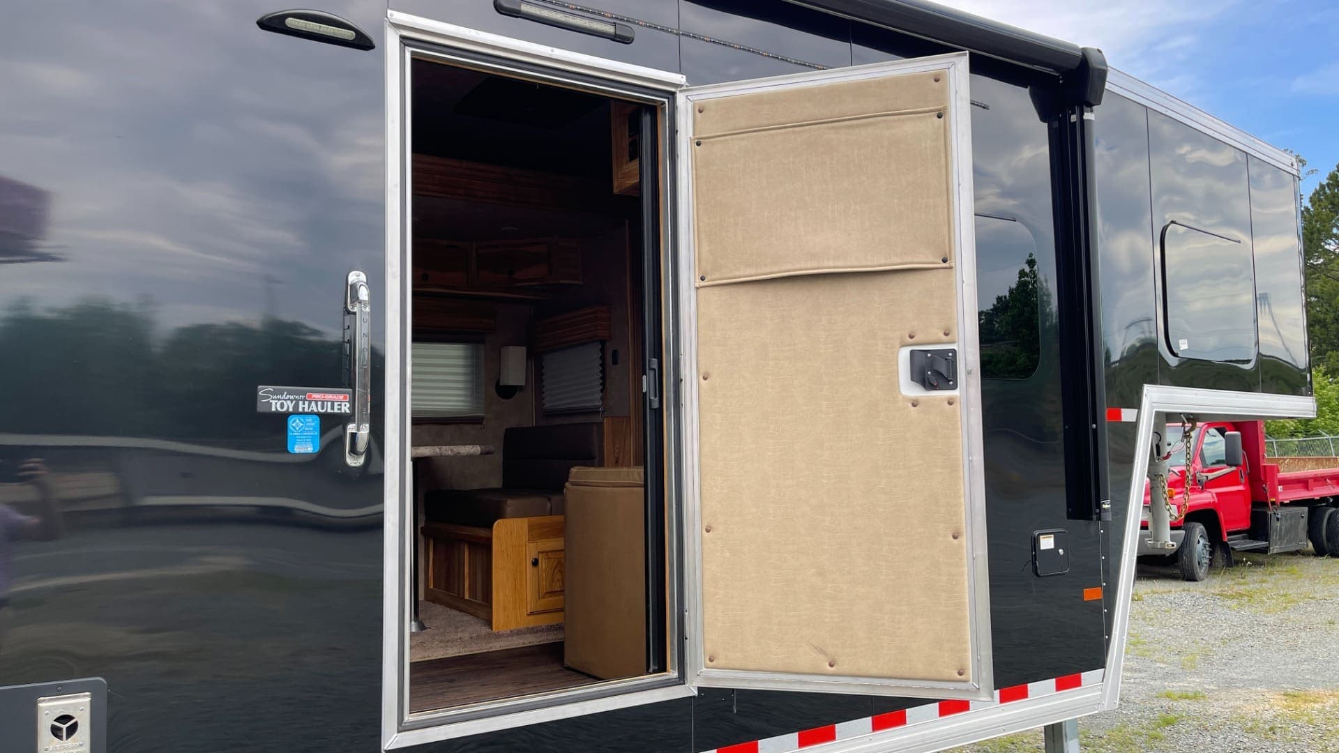 2020 Sundowner 2986 SGM Toy Hauler — 49' Triple-Axle, view